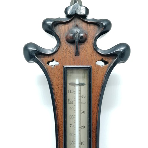 133 - James Lucking & Co (Birmingham) Art Nouveau oak barometer / thermometer with ebonised deep carved de... 