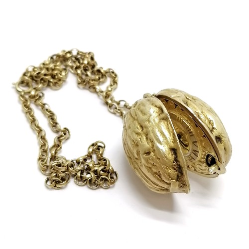 1984 silver gilt walnut pendant watch by St James's House Company on a