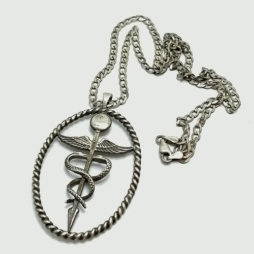 846 - Silver caduceus pendant (6cm) on a 48cm silver chain - 17g