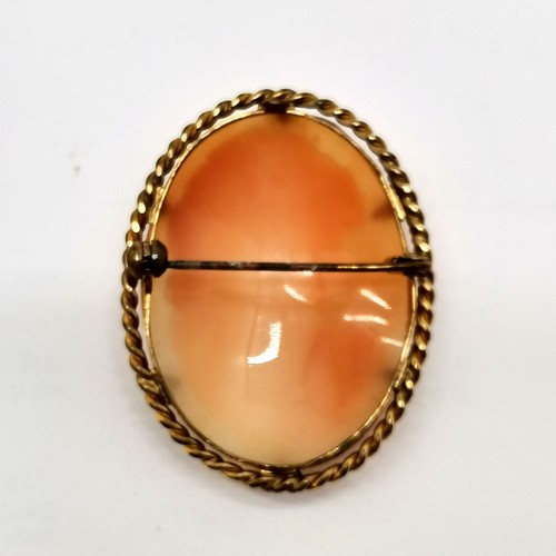 852 - Antique hand carved shell cameo portrait brooch in a gilt metal mount (6cm) t/w another