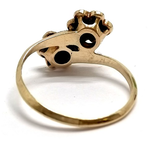 855 - Antique unmarked gold garnet & seed pearl double cluster crossover ring - size L½ & 2g total weight