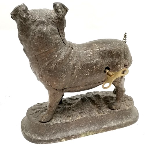 960 - Antique spelter mantle clock of a Pug dog, with animated tongue & wagging tail, replacement tail. ru... 
