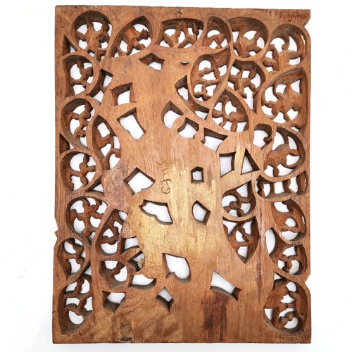 158 - Oriental carved teak wall plaque, 28 cm wide, 37 cm high.