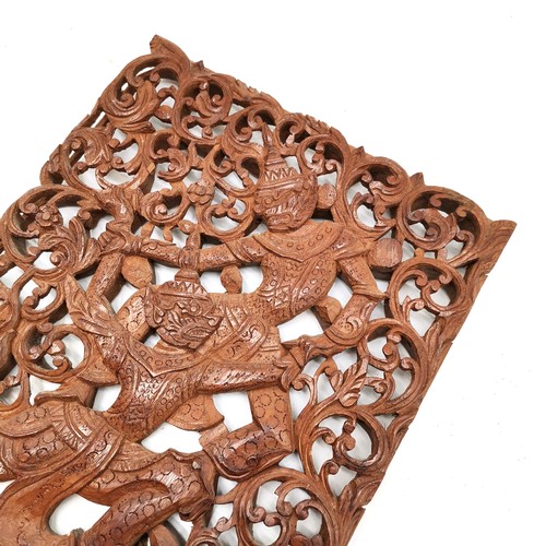 158 - Oriental carved teak wall plaque, 28 cm wide, 37 cm high.