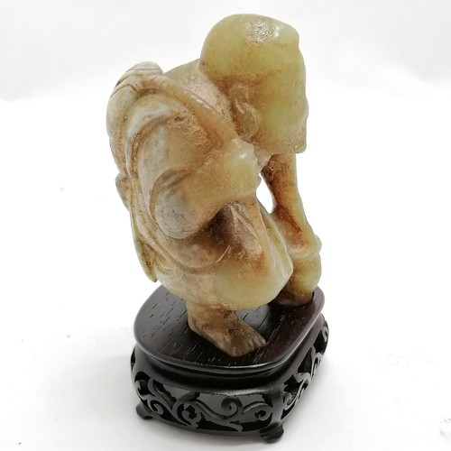 162 - Oriental Chinese antique hand carved jade figure of a fisherman on a carved wooden stand with an old... 