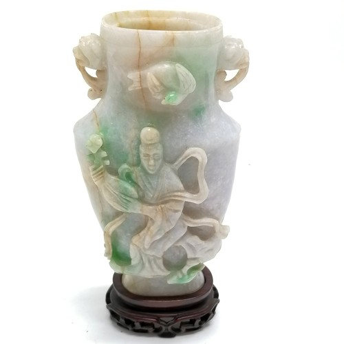 163 - Oriental antique hand carved Chinese jade vase with bird & figural detail on a hand carved wooden st... 