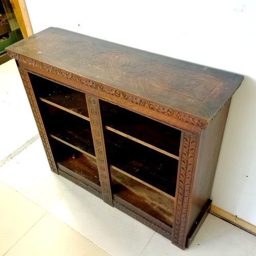 182 - Antique oak carved decorated bookcase, fitted with 2 adjustable shelves, 108 cm wide, 32 cm deep, 90... 