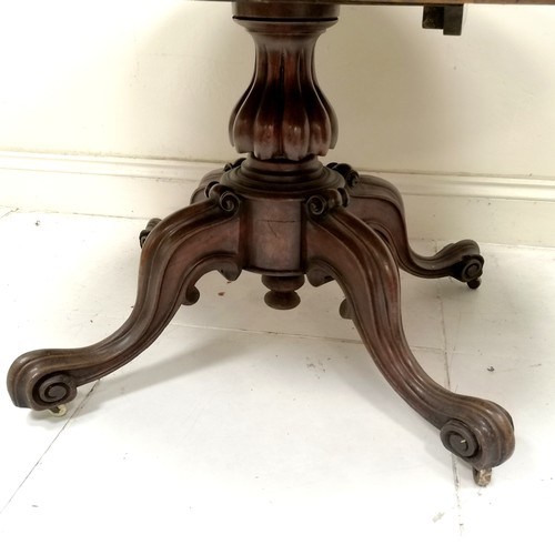 183 - Victorian walnut oval tilt top centre table, on carved centre pedestal, carved cabriole legs with ce... 