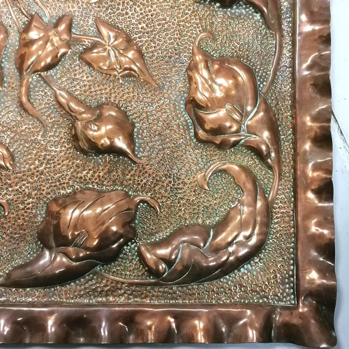 189 - Arts and Crafts copper plaque decorated with Cala Lilly's, 48 cm square, in good condition.