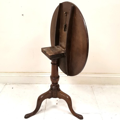 191 - Antique oak tilt top circular occasional table on turned column on tripod base, ring marks to top, 7... 