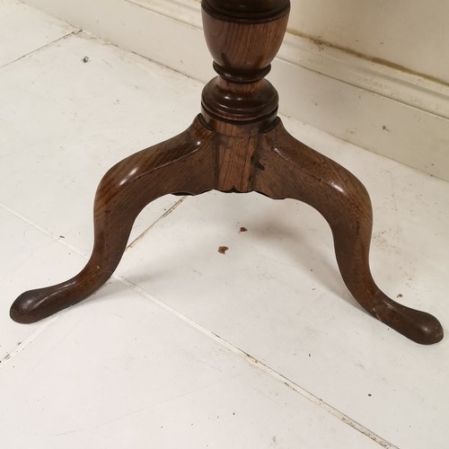 191 - Antique oak tilt top circular occasional table on turned column on tripod base, ring marks to top, 7... 