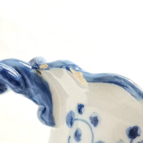 195 - Blue & White tin glazed vase with rope twist handles, decorated with house scene on 1 side, and the ... 