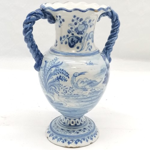 195 - Blue & White tin glazed vase with rope twist handles, decorated with house scene on 1 side, and the ... 