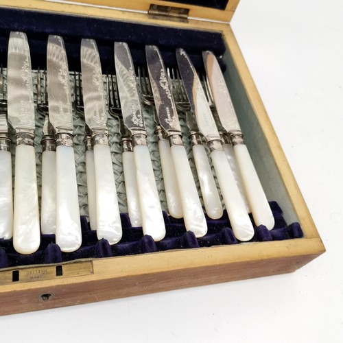 208 - Cased set of 12 mother of pearl handles fruit knives and forks, with silver band for Sheffield 1912,... 