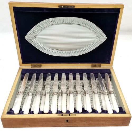 208 - Cased set of 12 mother of pearl handles fruit knives and forks, with silver band for Sheffield 1912,... 