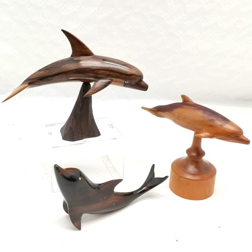 224 - Rosewood carved dolphin on naturalistic base, 20 cm high, 27 cm length, t/w 2 similar.