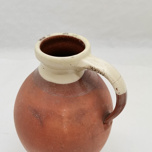 226 - Antique terracotta dairy jug, crack to handle, 26 cm high t/w Staffordshire  jug, 20 cm high.