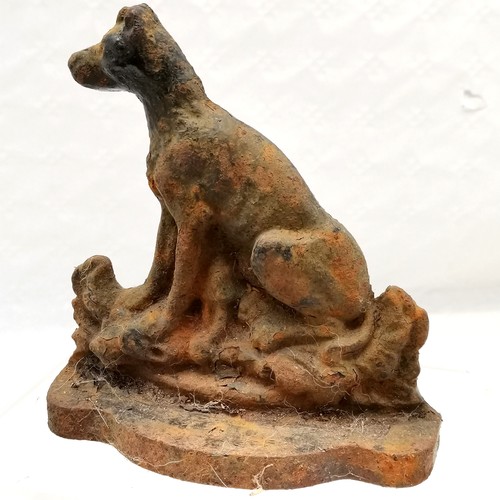 234 - Cast iron doorstop in the form of a ram, 23 cm wide, 16 cm high, t/w 2 others 1 being a dog and the ... 