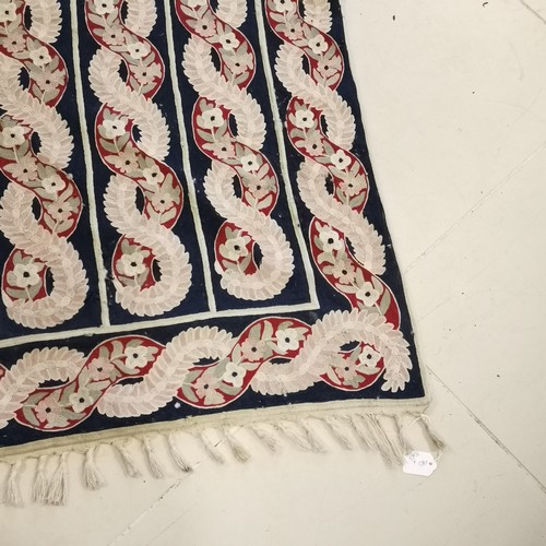 242 - Vintage crewel work rug with all over red and blue floral decoration. 90 cm wide 160 length. with si... 