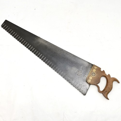 251 - Antique Hamstone saw by Taylor Bros Sheffield, in good used condition handle does have signs of old ... 