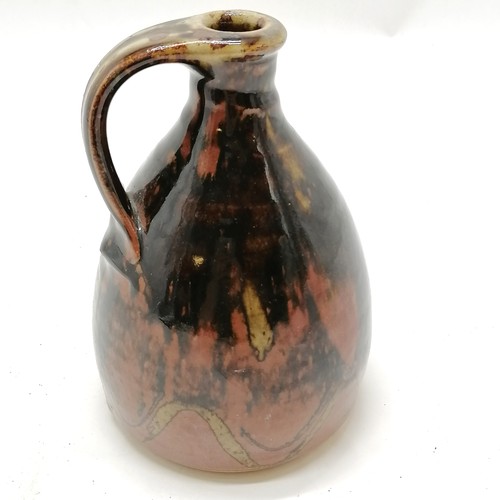 256 - Muchelney high fired glazed vessel with strap handle - 16cm high & no obvious damage