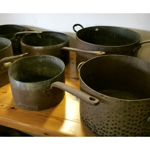 284 - Collection of assorted Antique copper pans of varying sizes, t/w 2 assorted chains.