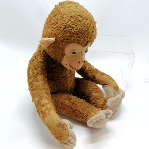 296 - Large antique straw filled jointed monkey (Schuco?) with felt detail - 65cm high with some love worn... 