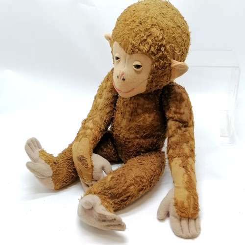 296 - Large antique straw filled jointed monkey (Schuco?) with felt detail - 65cm high with some love worn... 