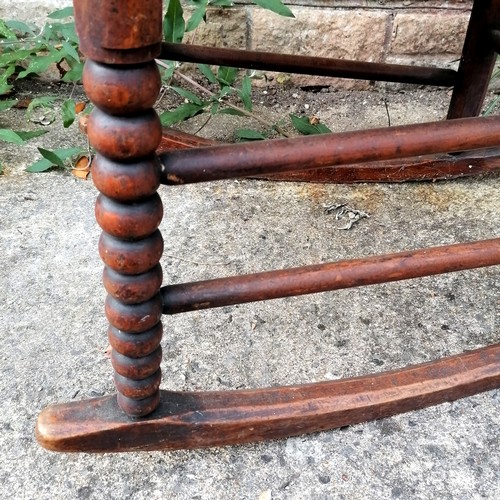 349 - Antique Arts & Crafts (Libertys?) rush seated rocking chair with bobbin turnings - 115cm high x 57cm... 