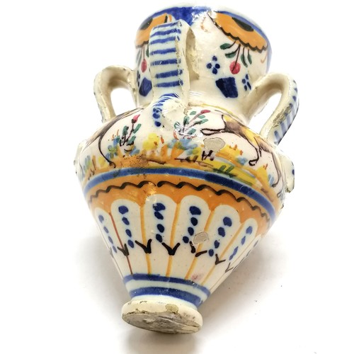 364 - Maiolica pot with 4 tag handles & animal detail - 13cm high and has slight hairline but no obvious d... 