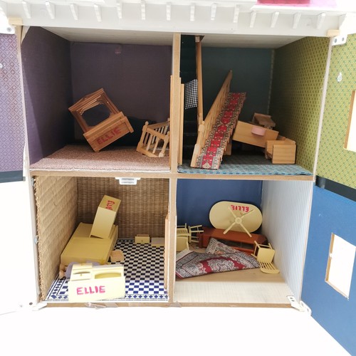 489 - Pink painted dolls house to include a selection of assorted furniture and furnishings, 50 cm wide, 6... 