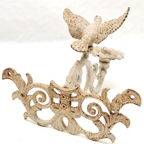 490 - Cream cast iron candle wall sconce mounted with dove, 29 cm wide, 28 cm deep, 25 cm high, in good us... 