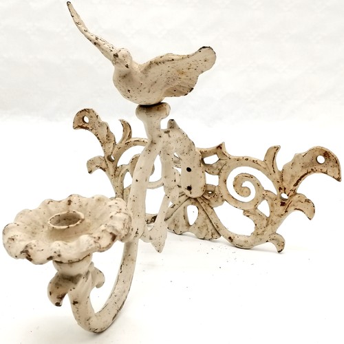 490 - Cream cast iron candle wall sconce mounted with dove, 29 cm wide, 28 cm deep, 25 cm high, in good us... 