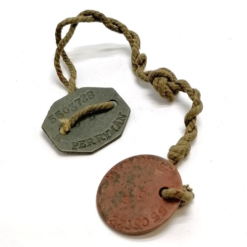 494 - Pressed fibre pair of ID / dogtags - C E Perryman 5503728 (Church of England)