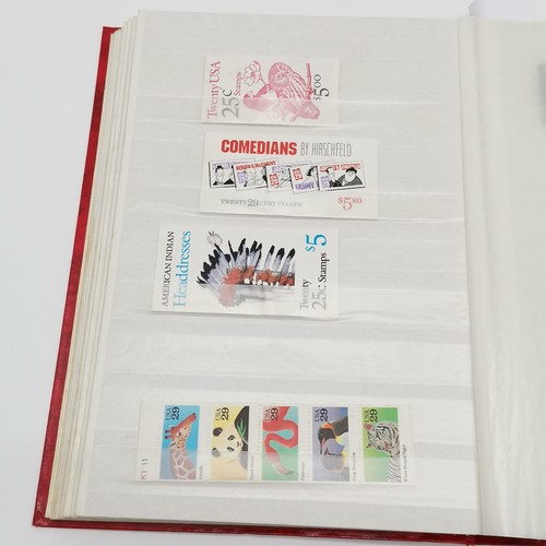 496 - Red stockbook with qty of mostly mint USA t/w Christmas stamps, Hawaii, booklets (some evidence of d... 