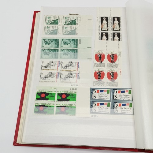 496 - Red stockbook with qty of mostly mint USA t/w Christmas stamps, Hawaii, booklets (some evidence of d... 