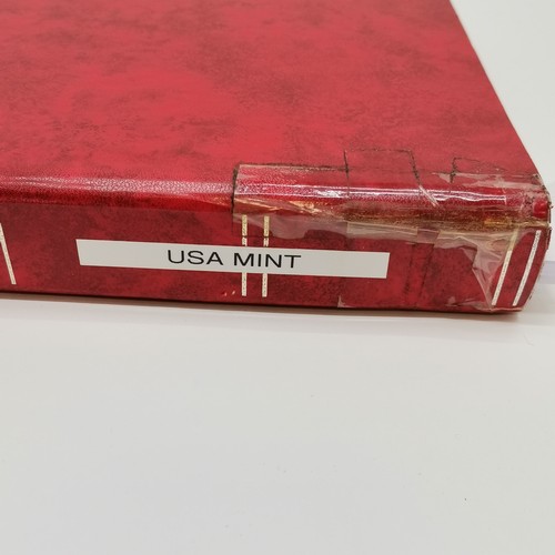 496 - Red stockbook with qty of mostly mint USA t/w Christmas stamps, Hawaii, booklets (some evidence of d... 