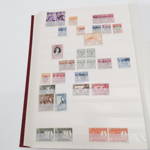 497 - Malaysia collection in red stockbook with various states inc Penang, Federated Malay States, North B... 