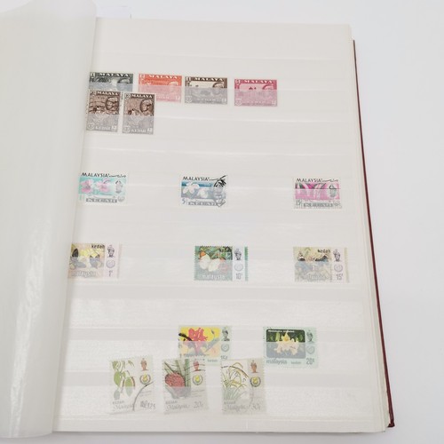 497 - Malaysia collection in red stockbook with various states inc Penang, Federated Malay States, North B... 