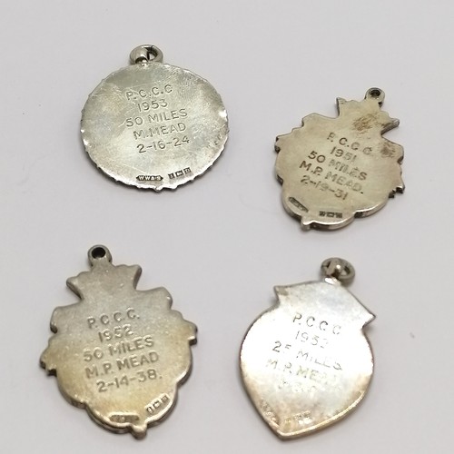 503 - 4 x 1950's silver cycling medallions / fobs with unmarked gold detail - total weight 38g