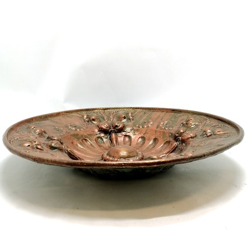 221 - Antique continental large copper charger, with all over floral and fruit decoration. 53 cm diameter,... 