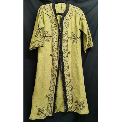 71 - Vintage green felt coat with black embroidery, buttons and trim, few small moth holes, small stain t... 