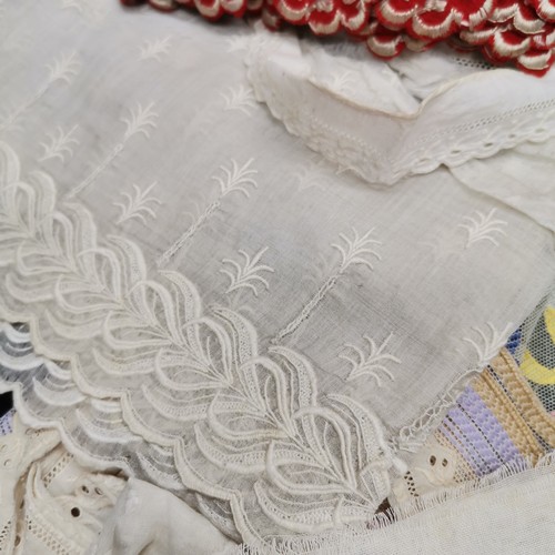 115 - A lot of lace and fabric trims to include satin embroidered with silver thread and red trim
