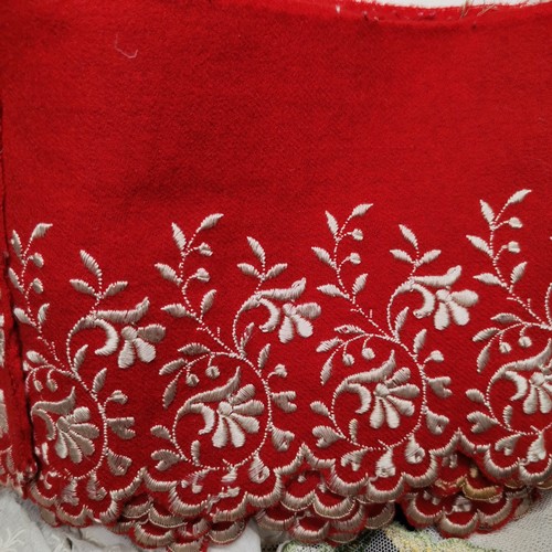 115 - A lot of lace and fabric trims to include satin embroidered with silver thread and red trim