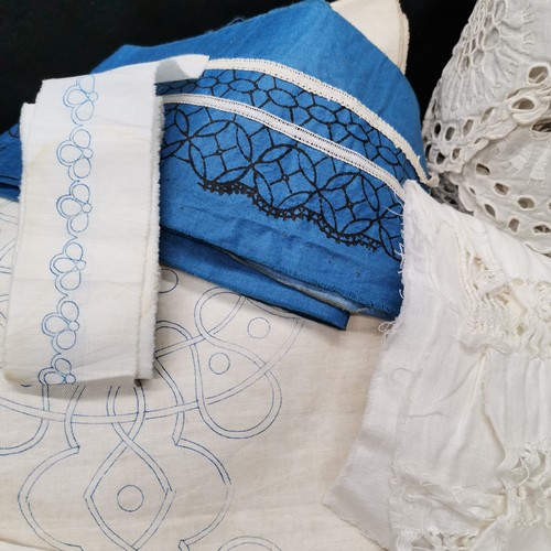 116 - A lot including trim, embroidery stencils and a large piece of broderie anglaise