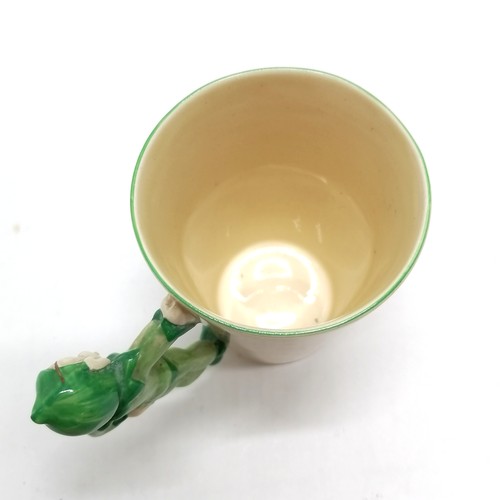 10 - Clarice Cliff (c.1936) mug with pixie / elf handle by Wilkinsons - 9.3cm high & no obvious damage