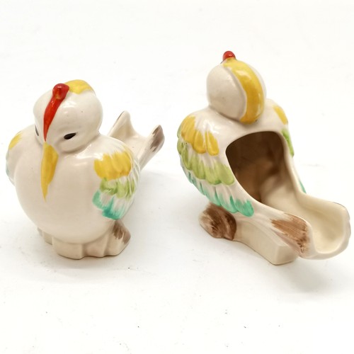 13 - Pair of Clarice Cliff pipe rests / holders in the form of exotic birds - 7 cm high & no obvious dama... 