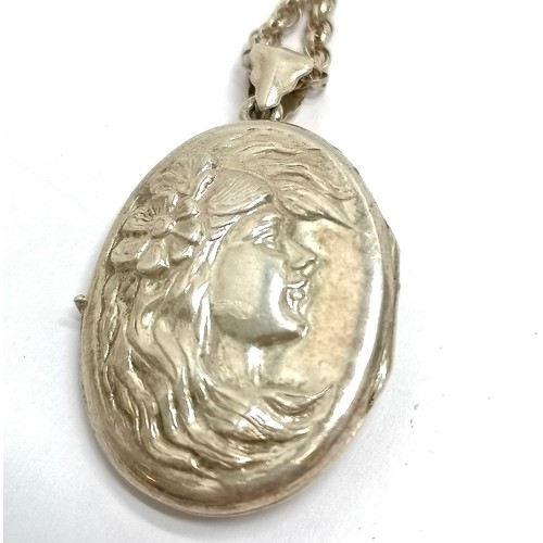 521 - Silver hallmarked Art Nouveau style locket with ladies head detail on a silver 44cm chain - 16g