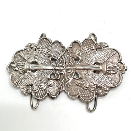 527 - Silver nurses buckle with flaming torch / wings motif (Liberalism) by ES&Co - 9cm & 57g