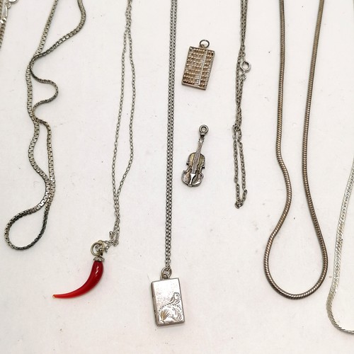 564 - 12 x silver neckchains with 4 pendants (red glass pendant on 40cm chain) - 43g total weight